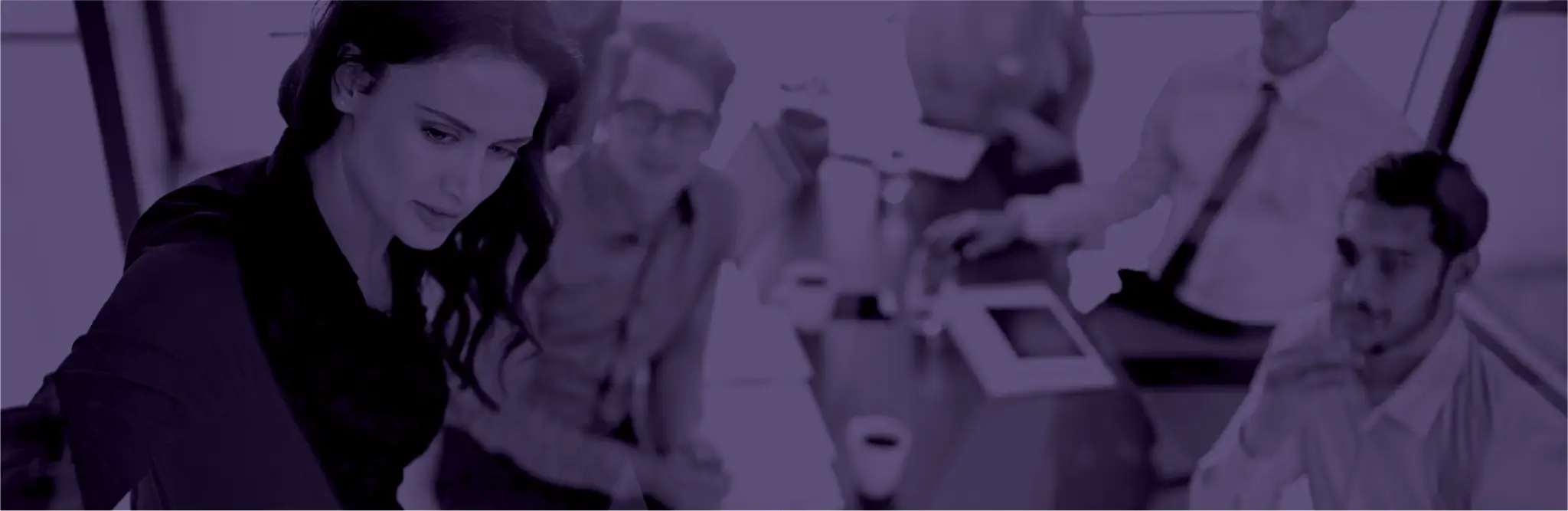 Business meeting with focused team discussion.